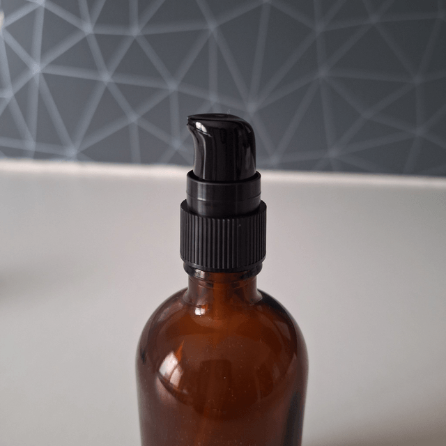 Flacon en verre ambré 100 mL avec bouchage pompe crème